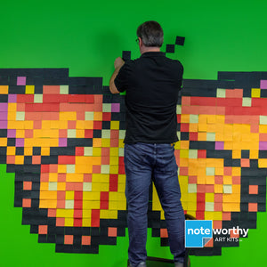 post it note mural of butterfly