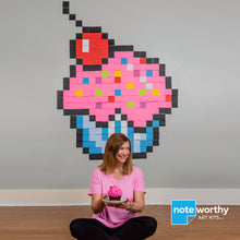 Load image into Gallery viewer, Post it note mural of large pink pixel art cupcake